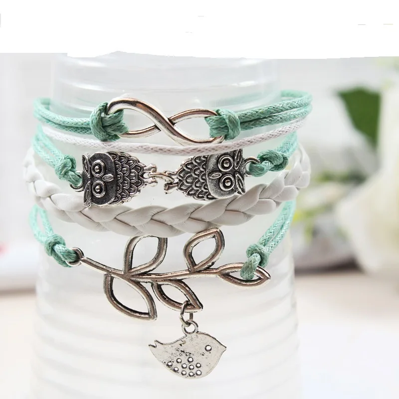 

Free Shipping 2017 Multi-layer Multi-root Combination Bracelet Lucky Olive Branch Owl Hand Women Bracelet Network Hot Sale