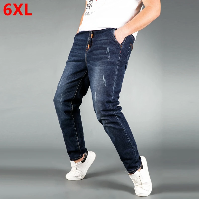 Large size jeans male loose trousers casual big man pants elastic waist Young plus fat loose version of large trousers Large size jeans male loose trousers casual big man pants elastic waist Young plus fat loose version of large trousers