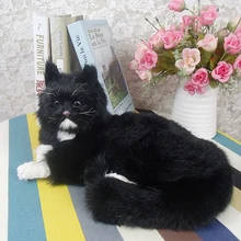 Большая игрушка для кошек из полиэтилена и меха, лежащая черная кошка, Модель около 32x23x15 см 1739
