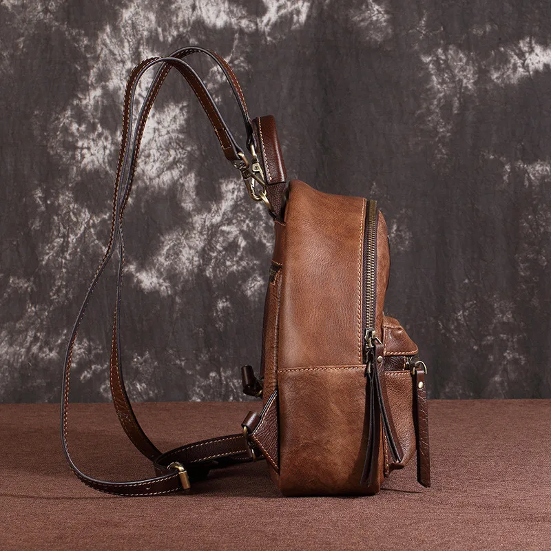 PNDME high quality vinateg top layer cowhide ladies backpack casual embossed genuine leather daily female small sling rucksack PNDME high quality vinateg top layer cowhide ladies backpack casual embossed genuine leather daily female small sling rucksack
