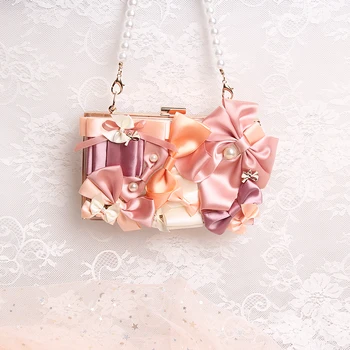 

2019 summer new chain color matching bow bag handmade pearl string portable fashion rectangular female small square bag