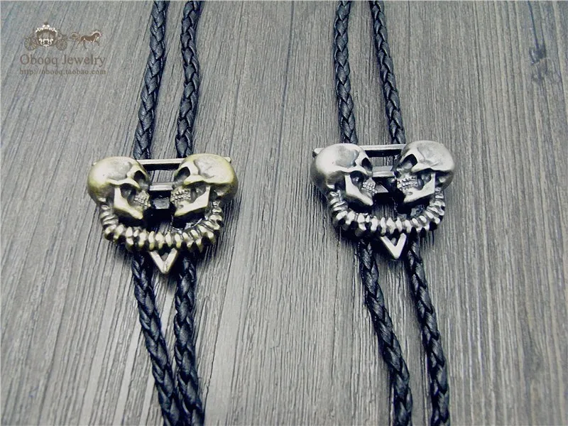 

Bolo Tie The latest retro shirt chain Double skeleton ghost head Poirot led rope leather necklace Long tie hang