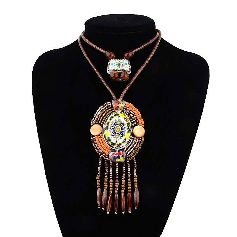 

Sweater Chain Leather Rope Long Pendants Bohemia Necklace Women Beads Tassel Ethnic Necklace Resin Boho Jewelry Wholesale
