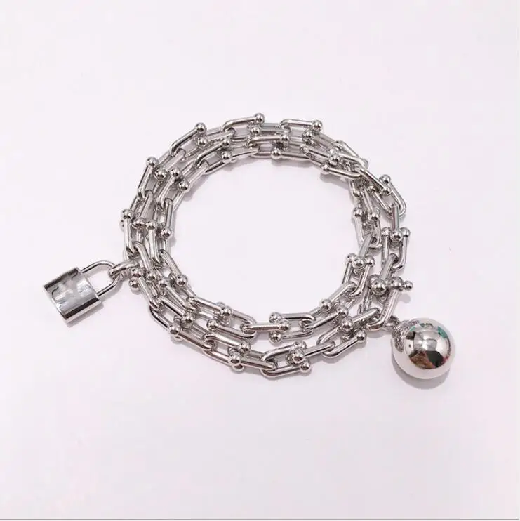 Armbanen voor vrouwen ювелирные изделия из титановой стали t образная u цепь замок мяч