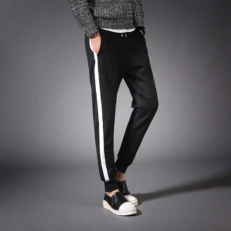 men's black track pants with white stripe