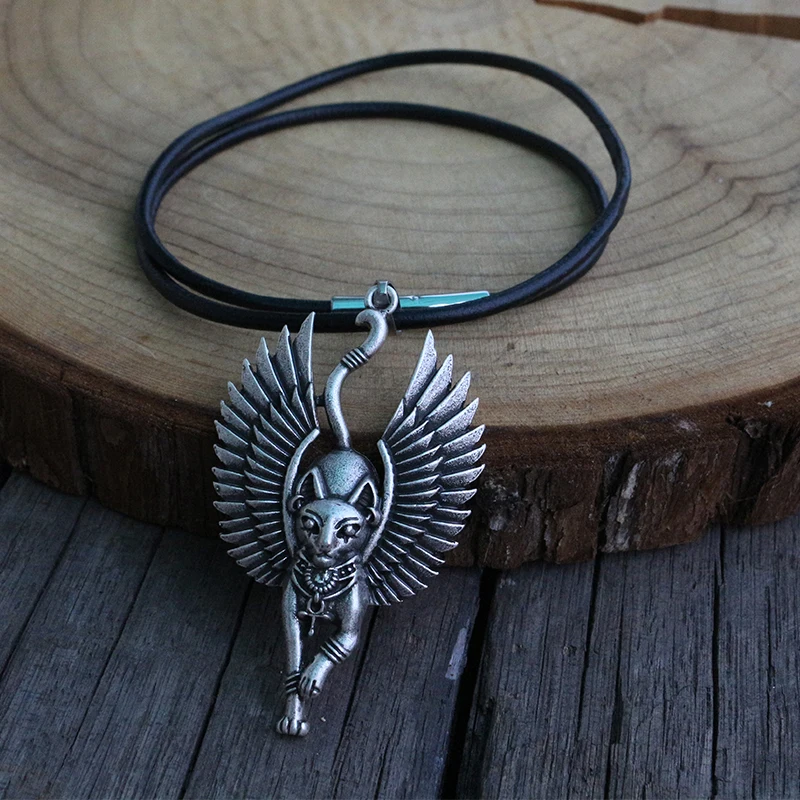 

Cat Bastet necklace Ancient Egyptian Bastet Statue Egyptian Sphinx Black cat Bastet pendant Egypt cat with wing