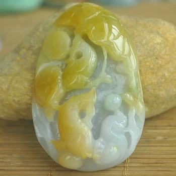 

High-grade refined natural jade moist and delicate hand carved fish pendant in Huang Fei