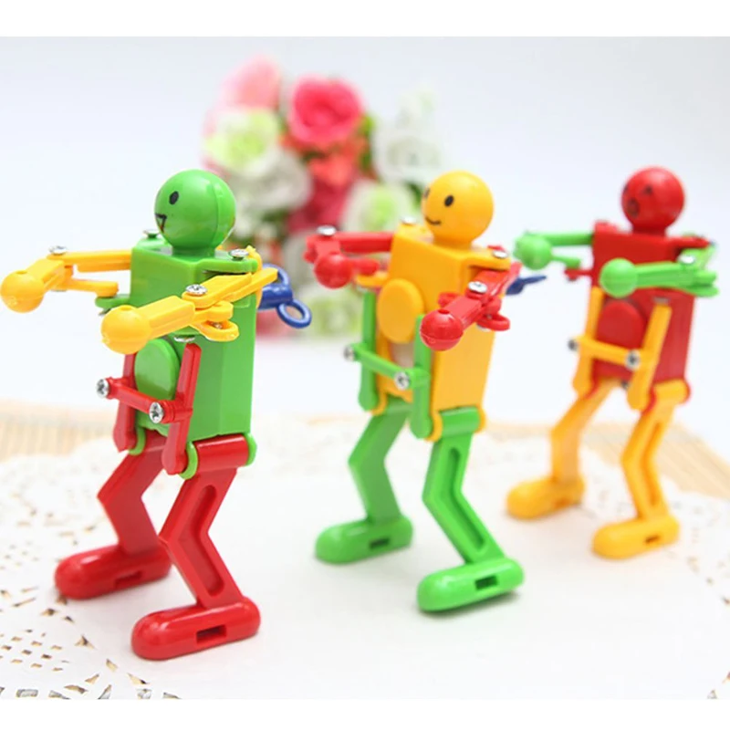 Spring Wind-up Girls Boys Walking Clockwork Gift Toy Dancing Robot Children
