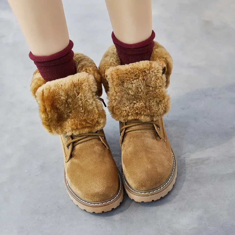 

2018 winter new retro leather platform high tube snow boots female soft bottom wild plus velvet warm boots.