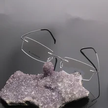 Marcos ópticos sin rebordes marca hombres titanium flexible marcos de anteojos anteojos de oro china llanura sin marco gafas myopia1004