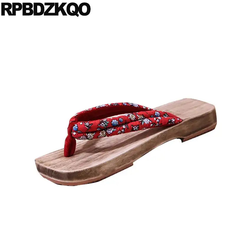 red designer flip flops