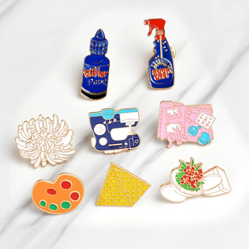 

Enamel pins Toilet flower Sewing machine Palette pyramid paint Hand tools Brooch Button Pin Denim Jacket Pin Badge Gift Jewelry