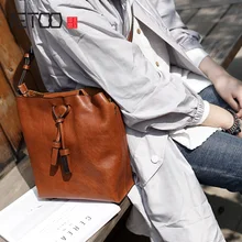 AETOO Handmade fashion shoulder crossbody bag, women's tanning cowhide pack, Lady leather bag small retro hand letter pack