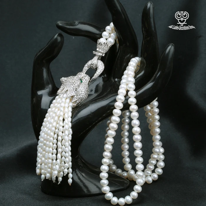

wholesale AA natural handmade 78cm pearl with Complete zirocn silver leopard head and 11cm pearl tassel