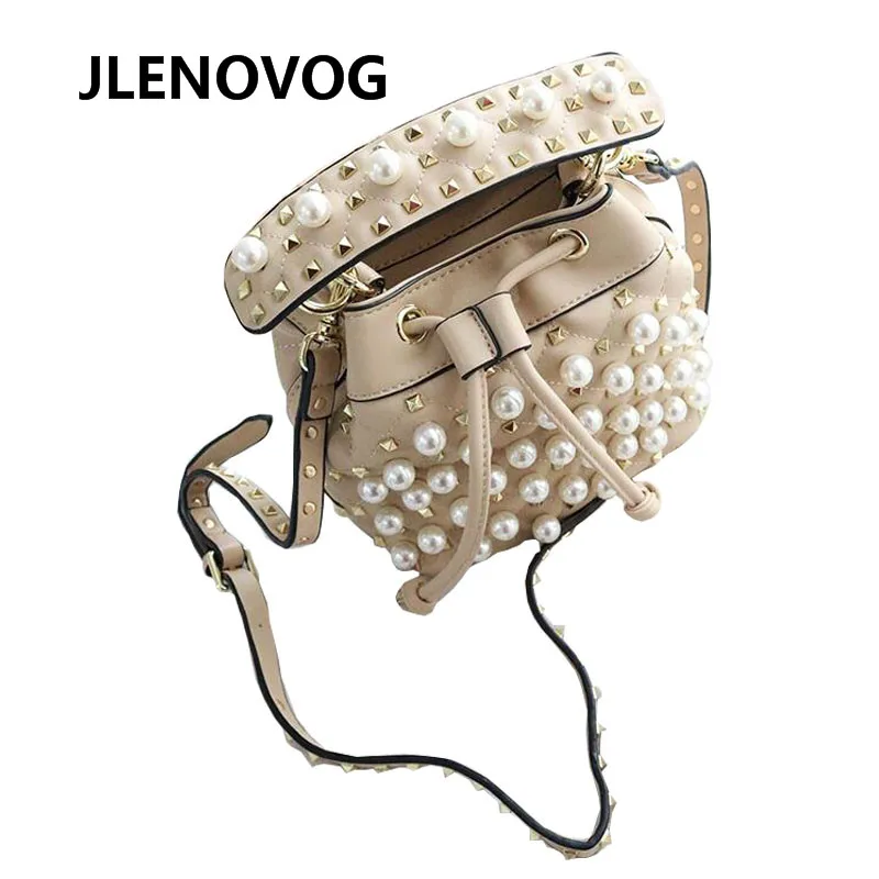 

One-shoulder diagonal portable soft handle outdoor travel spring new Korean version of super fire pearl rivet shoulder bag