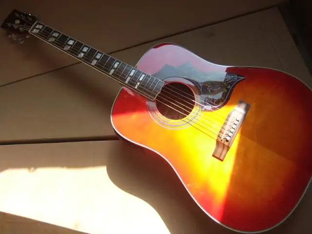 

Wholesale Cibson hummingbird acoustic guitar electric acoustic guitar Fishmanin cherry burst 101005