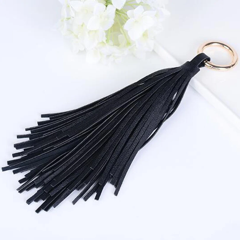 сумка с кисточками. брелок кисточка из кожи. брелок кисточка из кожи. брелок кисточка из кожи. кисть из натуральной кожи для сумки.
