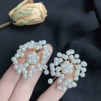 

Fashionable pearl flower earrings exaggerated pure manual weaving 925 needles fairy texture earrings