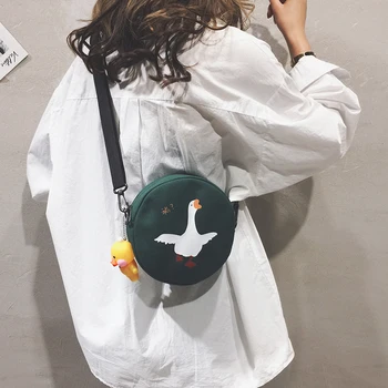 

Cute canvas handbag 2020 on the new port wind small round bag casual pendant Korean fashion wild shoulder Messenger bag