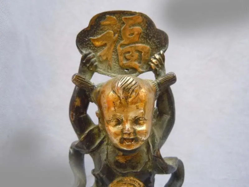 

DS China copper bronze gild carved boy on longevity peach Sculpture Statue