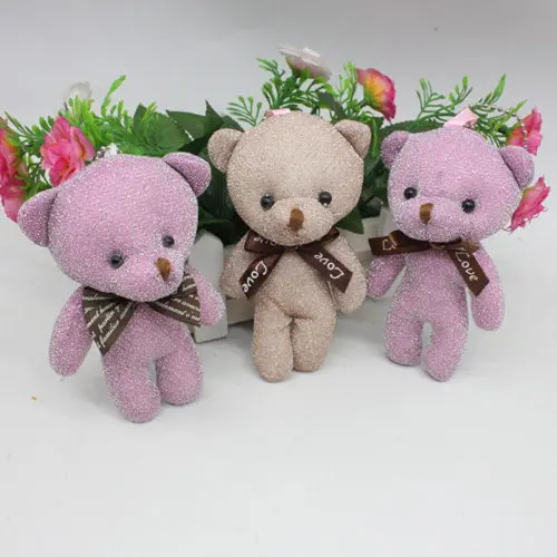 Bright silk bow tie, teddy bear doll, big head bear bag pendant, DIY creative mobile phone shell accessories, baby clothes, hats, shoes accessories, wedding promotion gifts 1