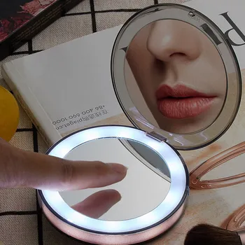 

Portable Mini LED Light Makeup Mirror Touchable Screen Foldable Magnifying Sensing Lighting Makeup Mirror with Charging 722