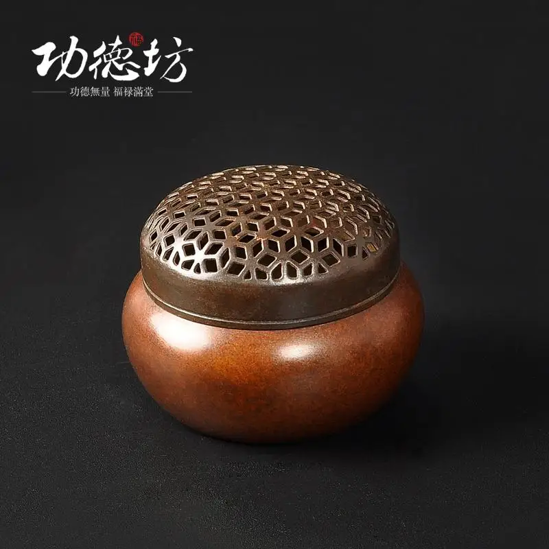 

Antique incense burner copper sink sandalwood incense coil furnace oil burner warm hand cone of fragrant red incense and incense
