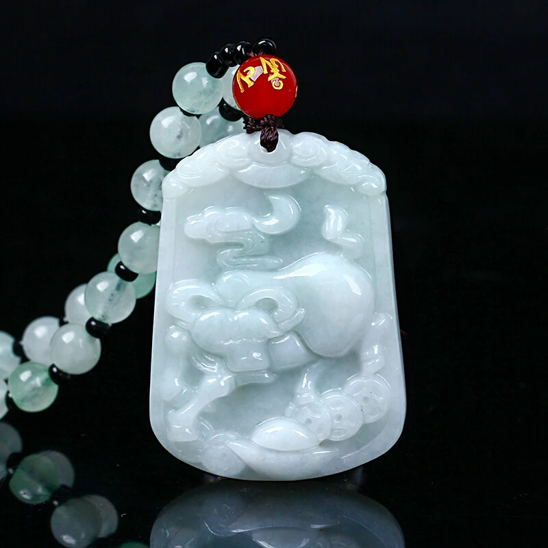 

Natural jadeite Chinese zodiac jade pendant Zodiac Cattle transshipment jade Yu Pei necklace pendant Send a certificate