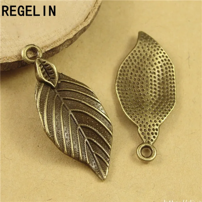 

REGELIN Antique Bronze leaf Charm Pendant 10pcs 32x12mm for Diy Necklace Jewelry Making Handmade Craft jewelry accessories