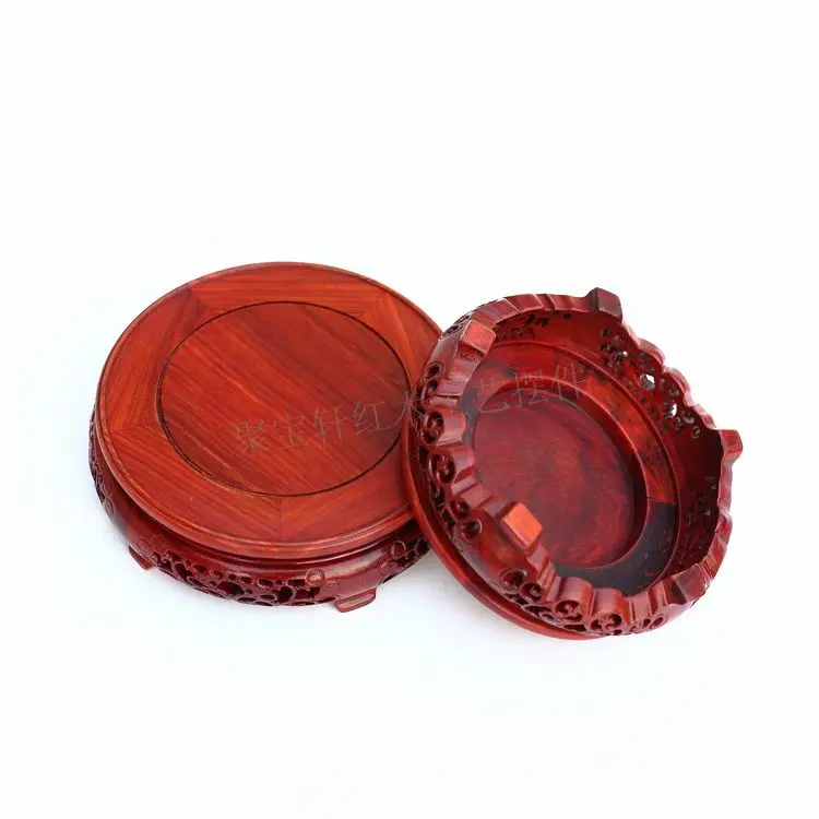 Red wingceltis of solid wood carving round base household act the role ofing is tasted annatto handicraft furnishing articles