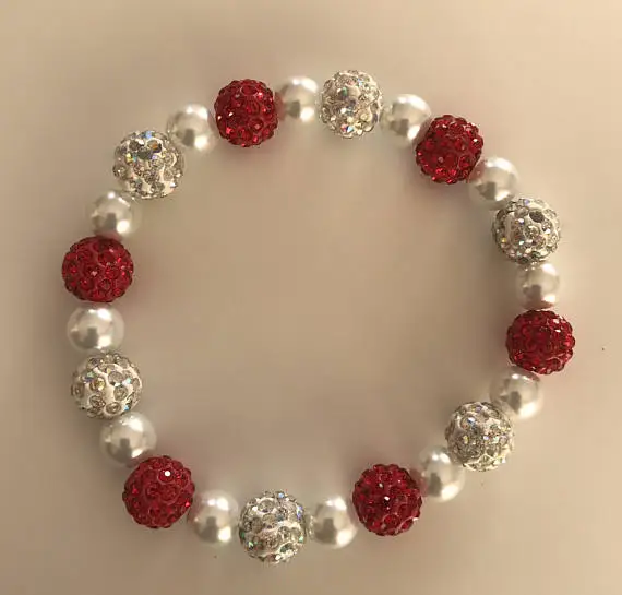 

Delta sigma theta red and white clay stone beads adjustable bracelet with glass pearl available customized.OGL100.1pcs sold