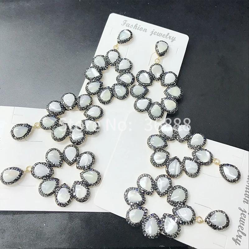 

Новые модные серьги в виде ракушек с лепестками черные кристаллы в богемном стиле преувеличенные личные аксессуары