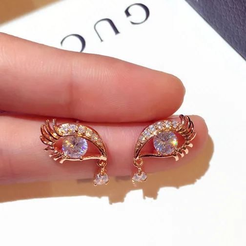 

New fashions Korea Earrings drill eye temperament funny ear studs eardrop Crystal Women Push-back stud earring