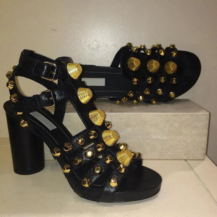 red heels with gold studs