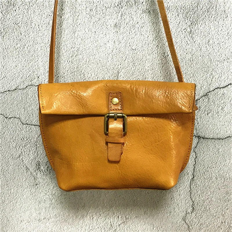

Explosion models 2019 new fashion genuine leather messenger bag mini vegetable tanned small bag retro shoulder bag