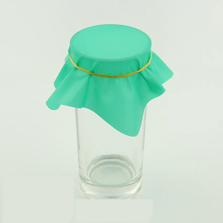 Coin Through A sheet of Rubber Coin Into Cup / Pena Coin