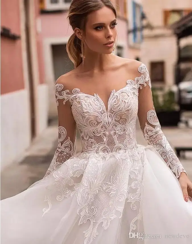 naviblue-latest-princess-wedding-dresses-scoop-neck-long-sleeve-lace-bridal-gowns-saudi-luxurious-custom-made-illusion-a-line-wedding-dress (1)