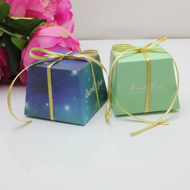 

Hot New 100pcs/lot Tiffle Blue Trapezium Candy Box Marriage Gift Bag Fold Small Box Starry Blue Box Wedding Party Birthday Decor