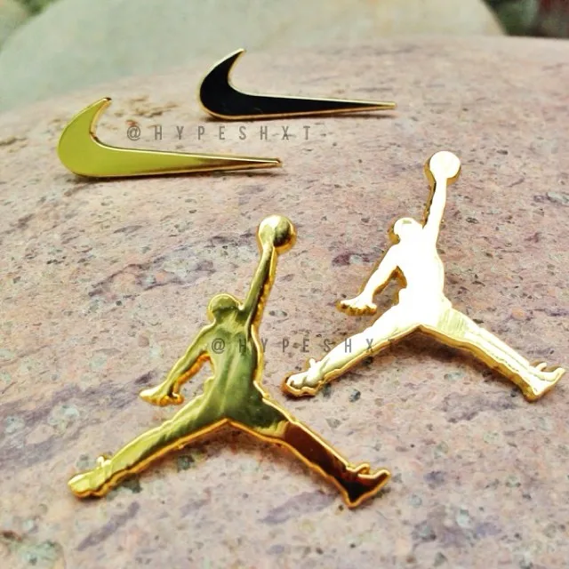 gold nike pins