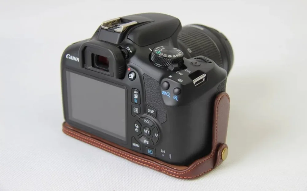 Новый Натуральная кожа половина Камера чехол для Canon 1100D 1200D 1300D натуральная кожа нижней видео сумка крышка открыта батареи непосредственно