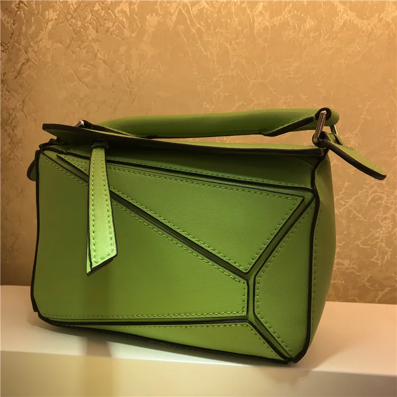 

2019 New design leather summer contrast color handbag promotion female models zipper shoulder diagonal package mini square bag