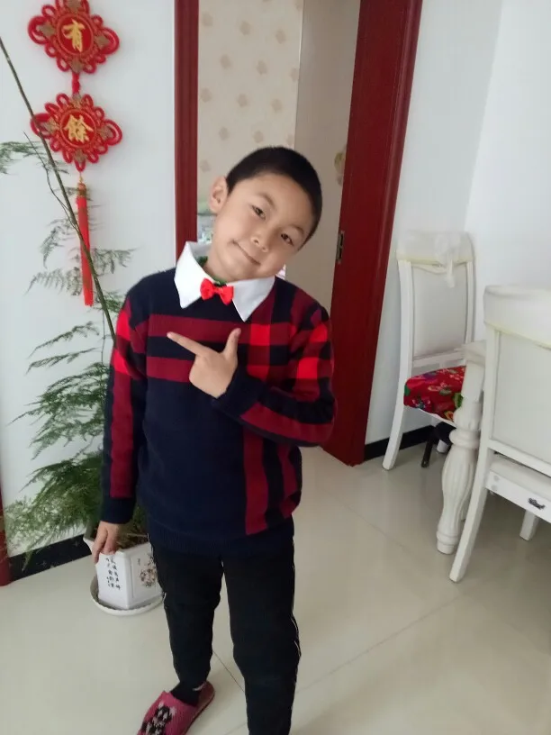 The boy's new casual sweater