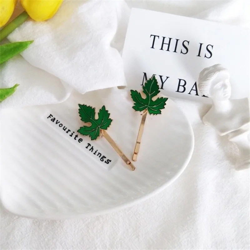 

The New Green Maple Leaf Hairpin Temperament Female Fresh Literary Style Korean Sen Wild Wild Hair Accessories Wholesale
