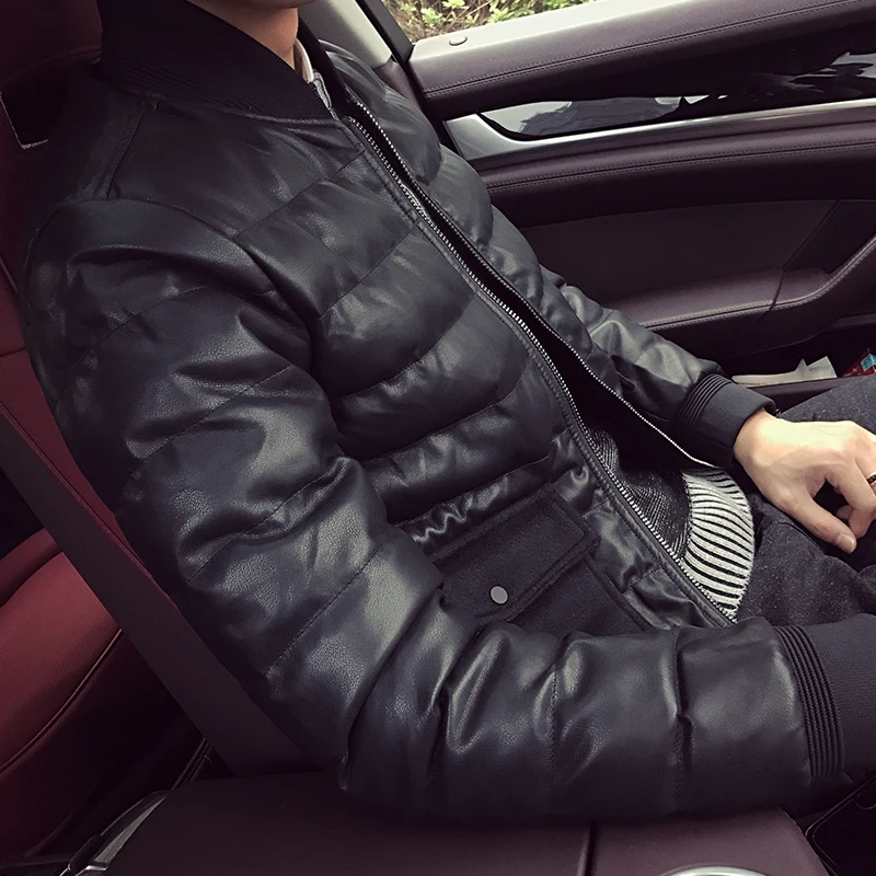 The new young man warm winter coat jacket pocket decoration thick jacket short slim padded.