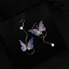 2022 Korea retro asymmetrical exquisite butterfly imitation pearl alloy long wings earrings for women's best gift ► Photo 3/3