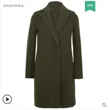The high end double sided cashmere overcoat has a long suit collar for women