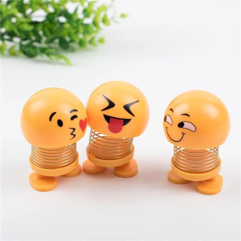New spring shaking head doll doll ornaments expression package car decoration cute creative car interior decoration5*7cm