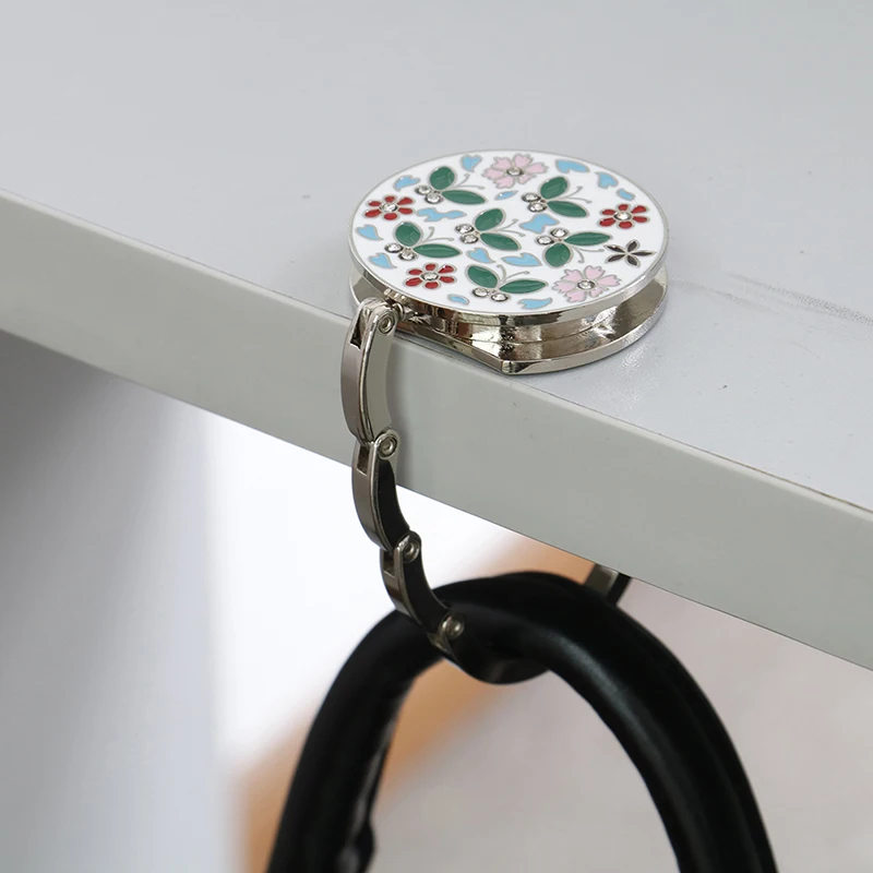 Pequeños ganchos portátiles, bolsa plegable para colgar, bolso, cartera con  gancho, bolsa de Metal con forma de flor, colgador para mesa|Ganchos y  rieles| - AliExpress