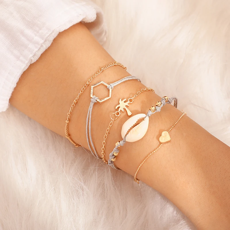 

Tocona Women Boho Ocean Shell Tree Heart Geometric Rope Multi Layer Bracelet Set Bohemian Party Charm Jewelry Gift C19509
