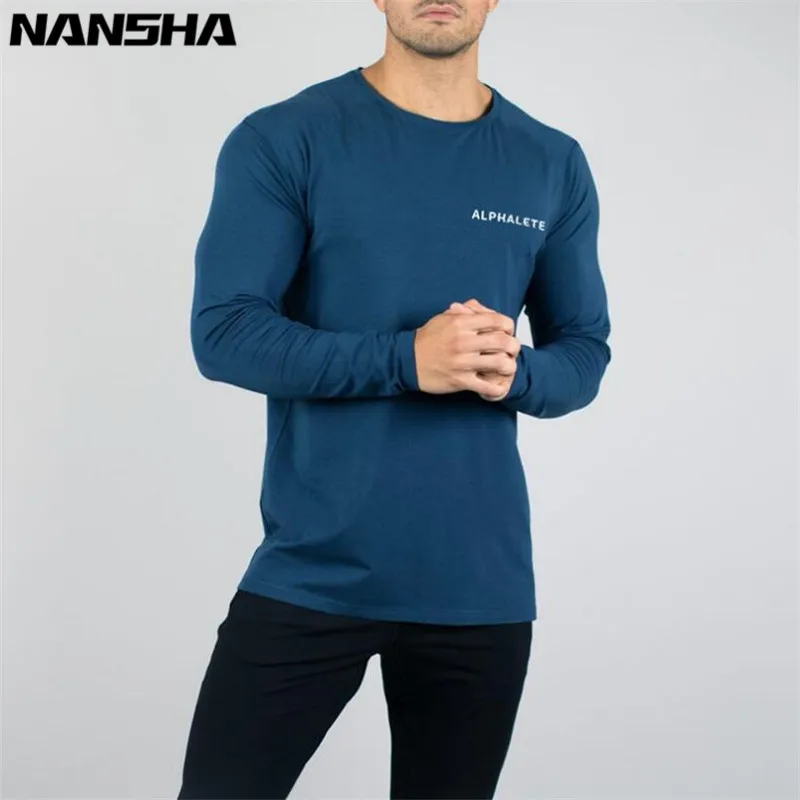 ALPHALETE جديد أزياء الجمنازيوم كمال الاجسام الرياضية تي شيرت الرجال طويلة الأكمام اللياقة البدنية الرجال الصلبة عالية الجودة تي شيرت